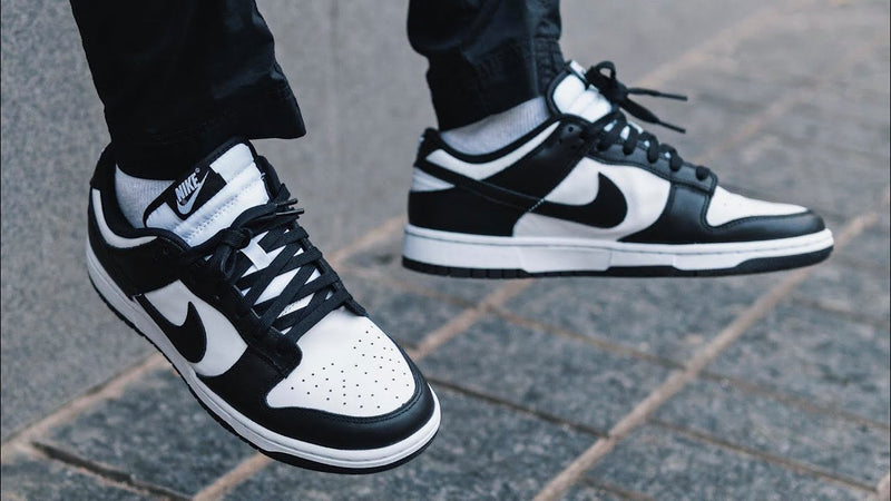 Nike Dunk Low Black and White on feet outdoors