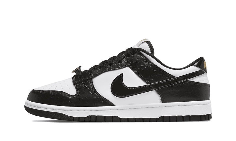 nike dunk low world champs black white side view